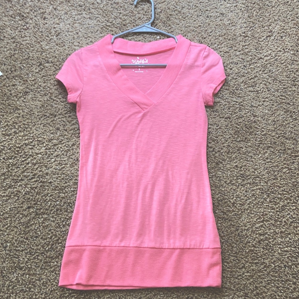 I am selling a pink top.